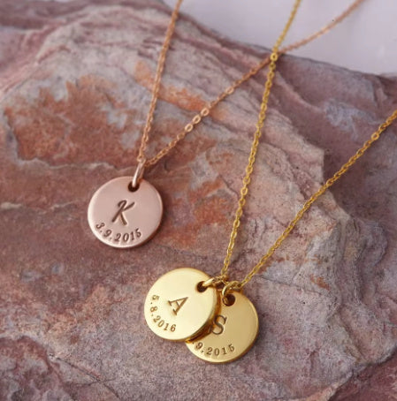 A Rusted Steel Engraved Round Plate Necklace With A Personalized Pet Head Engraving