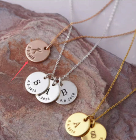 A Rusted Steel Engraved Round Plate Necklace With A Personalized Pet Head Engraving