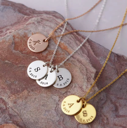 A Rusted Steel Engraved Round Plate Necklace With A Personalized Pet Head Engraving